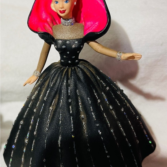 holiday barbie black and pink dress Barbie Happy Holidays Doll